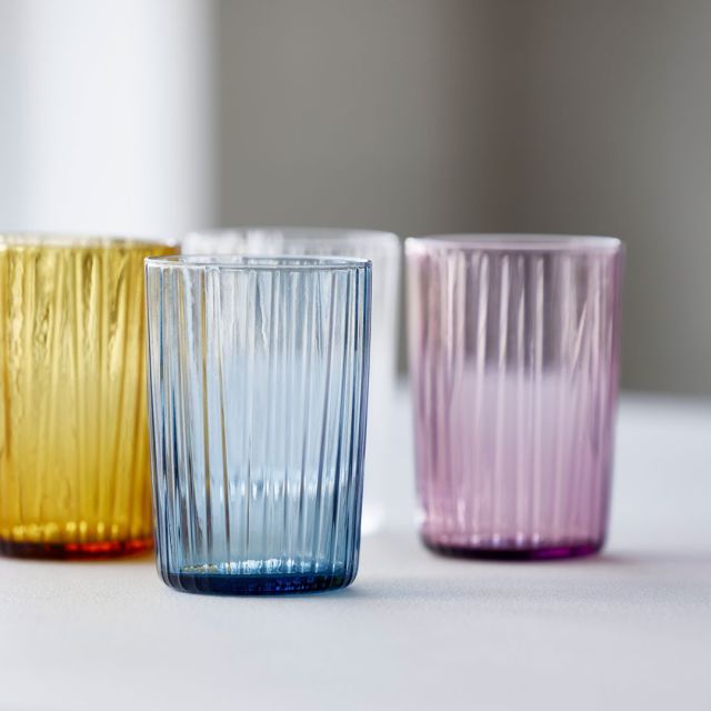 The beautiful Kusintha water glasses in coloured glass feature the same fluted look as the Kusintha series water bottles🥰⁠
⁠
The glasses are available in green, amber, pink, blue and a clear version.